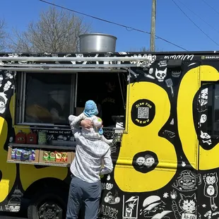 Front of their food truck.