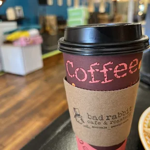 Coffee cup and sleeve