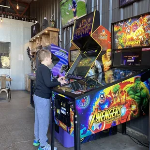 a young boy playing a video game