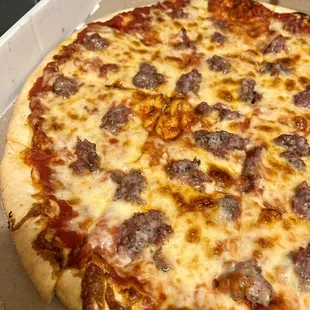 Sausage pizza with extra cheese