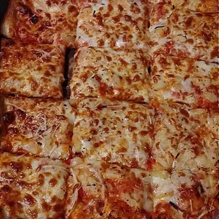 Luau pizza with ham, onion, pineapple, provolone and cheddar.