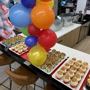 Yummy chocolate fudge caramel corn and vanilla fun Fetti funnel cake, cupcakes