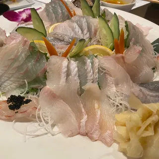 Live Sashimi, Side Dishes and Spicy Fish Soup