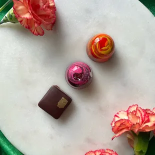 Valentine's Day Chocolate collection- three bonbons with hazelnut filling, masala chai caramel and mango raas ganache.