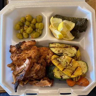 Deboned chicken, grilled veggies, vegetarian grape leaves, "olive plate."