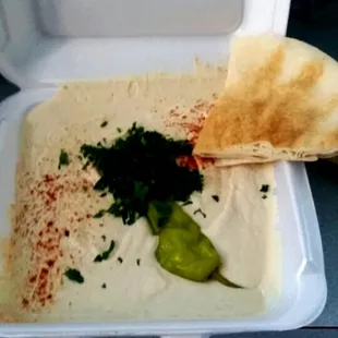 Large hummus appetizer to go.