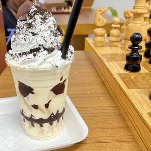 a chess game in the background