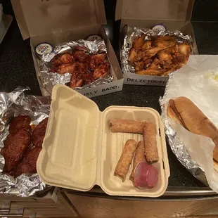 Chicken fingers shaken in BBQ, pizza logs, mild chicken finger sub, Medium &amp; BBQ chicken wings