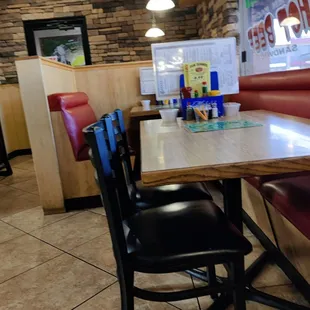 a table and chairs in a restaurant