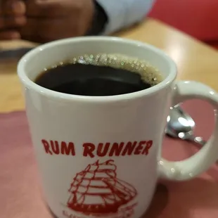 a cup of coffee on a table