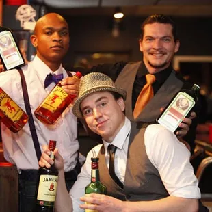 a bartender and two bartenders
