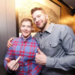 two men posing for a picture