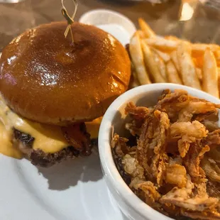 Bison burger with crispy onions on the side