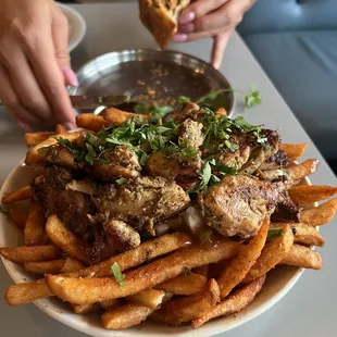 F Chicken Tika Poutine