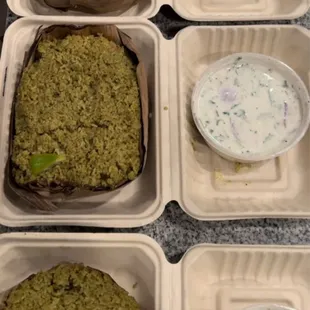 four trays of food with dips