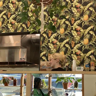 a woman behind the counter