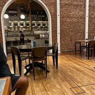 a woman sitting in a restaurant