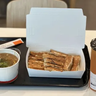 Combo 1 (signature potstickers &amp; hot and sour soup) with a lemon black tea.