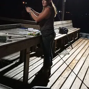 Marlena baiting up..."BAFFIN BAY INN"her favorite place to fish..