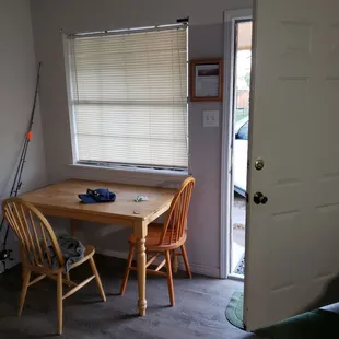 Small table by the door. Locks work