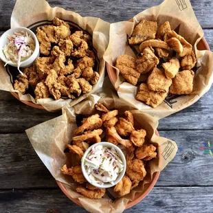 Top: Fried Gulf Coast oysters and drum Bottom: fried Gulf Coast shrimp
