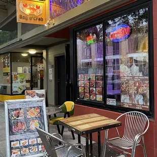  table and chairs outside a restaurant
