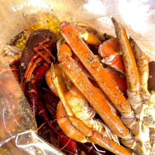  pile of crab legs in a bag