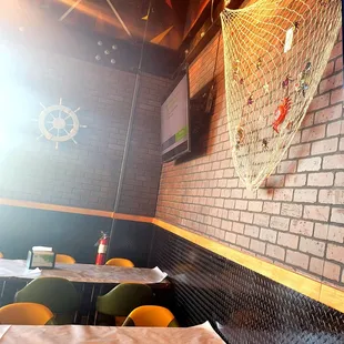  net hanging on the wall of a restaurant