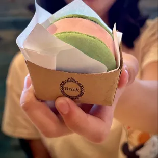 Strawberry macaron ice cream sandwich.