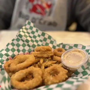 a basket of onion rings