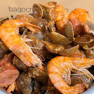 a bowl of cooked seafood