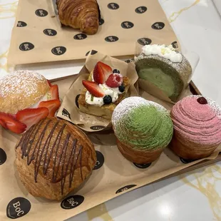 Marizatto, Pain au Chocolat, Bread Pudding, Matcha Cruffin, Raspberry Cruffin, Matcha Tokyo Roll, and regular Crossiant