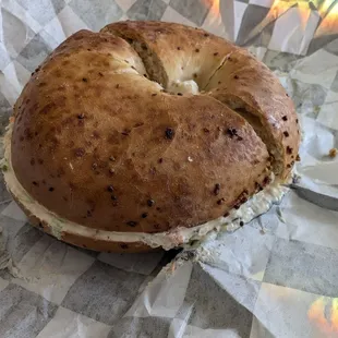 Garlic bagel with veggie cream cheese