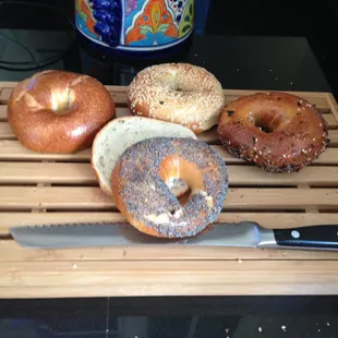 Plain, sesame, everything, and poppy seed bagels