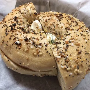 Toasted supreme bagel with (light? I hope?) scallion cream cheese.