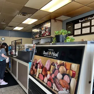 a woman standing at the counter