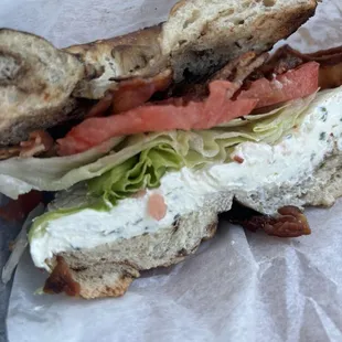 BLT with Bermuda Onion and Chive cream cheese on a rye bagel