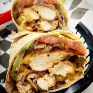 a wrap of chicken and vegetables