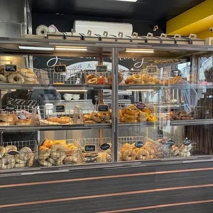 a display case full of pastries
