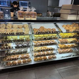 a display of various types of donuts