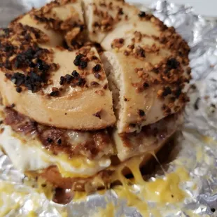 Egg, sausage and cheese breakfast bagel on a garlic bagel