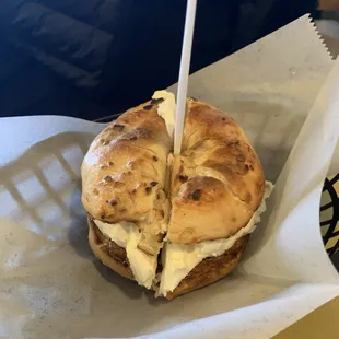 a bagel sandwich with cream cheese