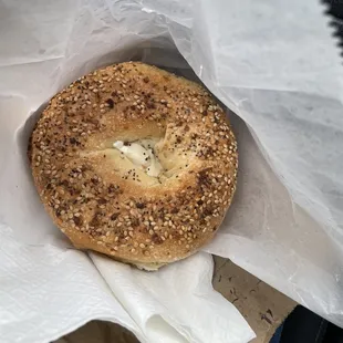 a bagel wrapped in paper