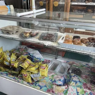 a display case filled with donuts