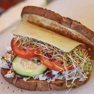 HARVEST HOUSE CHICKEN SALAD SANDWICH on Sourdough bread.