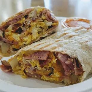 Breakfast burrito, ham, egg, cheese and potatoes.