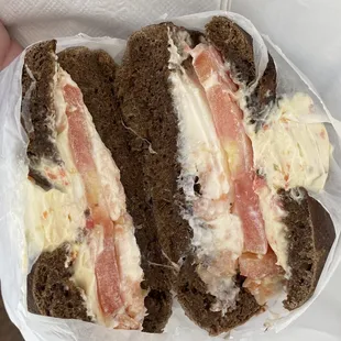 Toasted Pumpernickel bagel with nova spread and tomato