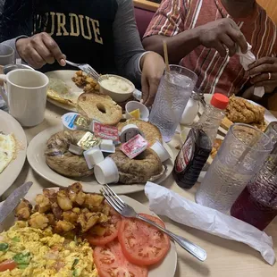 Mexican Scramble, Assorted Bagels, chicken and waffles, pancakes and bacon.