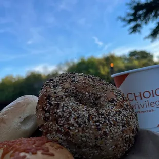 a cup of coffee and a bagel