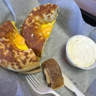 Egg and cheese on a cheddar bagel with a side of their cream cheese... yum
